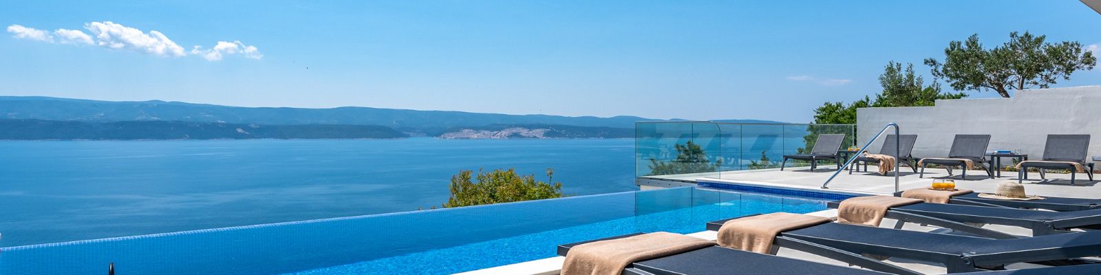 Swimming pool looking out onto the sea
