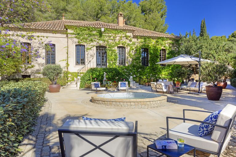 House in Spain with deck chairs