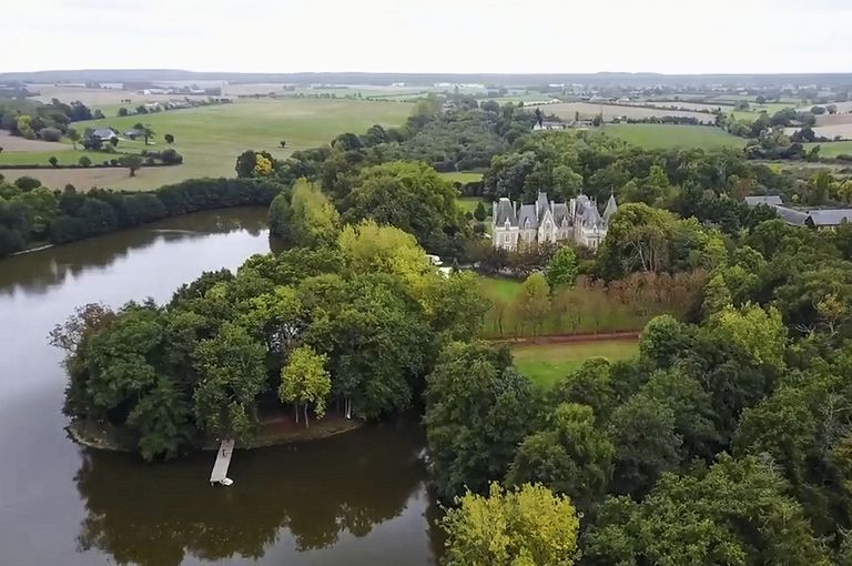 Aerial view of chateau in France in the forest