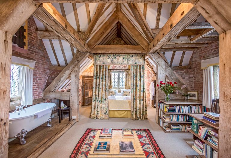 Old fashion bedroom with exposed wooden beams