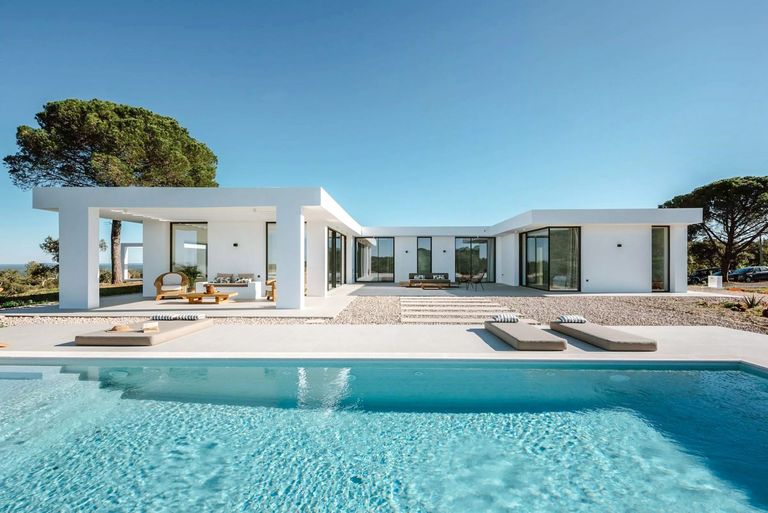 white villa with pool