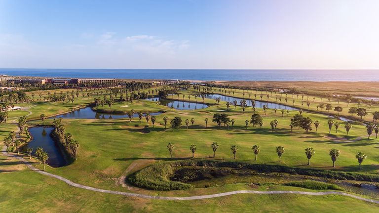 Green Golf Courses By The Sea. Salgados Beach. Portugal
